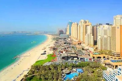a view of a beach with buildings and the ocean at BAHAR apartments on JBR by HAPPY SEASON in Dubai
