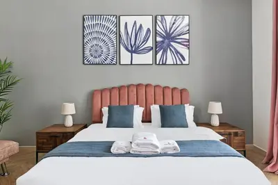 a bedroom with a bed with two towels on it at StoneTree - New Cozy Studio in Dubai Marina in Dubai