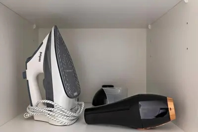 a white and black appliance sitting on top of a counter at StoneTree - Furnished 2 BR with Maids Room in Dubai Marina in Dubai