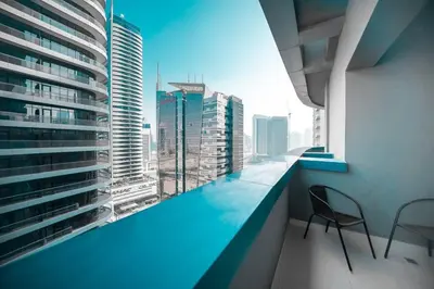 a view of a city skyline from a building at StoneTree - Furnished 1BR in Prime Location in Dubai