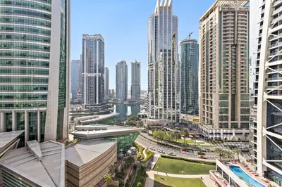 a view of a city with tall buildings at StoneTree - Stylish Studio near Metro Station in Dubai