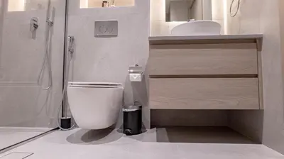 a bathroom with a toilet and a sink at Classy 1 BR Apartment in Greens in Dubai