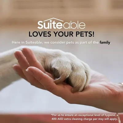 a hand with a small animal on top of it at Your beachfront luxe escape experience - Suiteable in Dubai