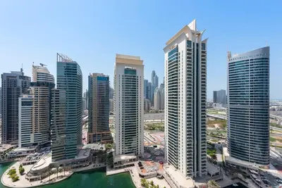 an aerial view of a city with tall buildings at StoneTree - NEW Furnished 1BR in V3 Tower in Dubai
