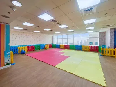 a brightly colored room with a large rug at Exclusive Studio by Burj Khalifa and Dubai Mall, High Floor in Dubai