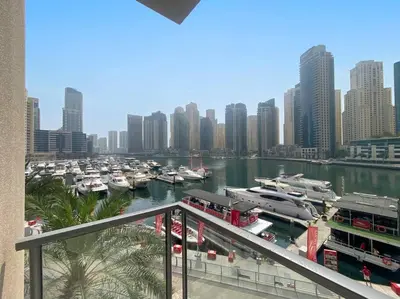 a view of a marina with boats in a harbor at Breathtaking Marina View - Spacious Apartment in Dubai
