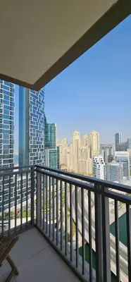 a balcony with a view of the city at Amazing 4-bedroom Apartment in Dubai
