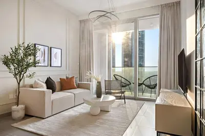 a living room with a couch and a table at Silkhaus classical 1BDR in Opera District in Dubai
