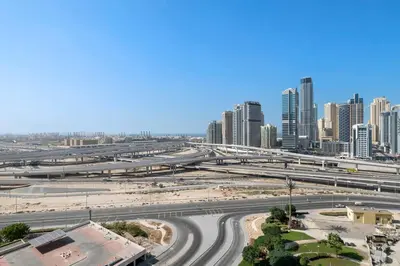 a view of a city with tall buildings at StoneTree - Chic & Modern 1BR in Dubai