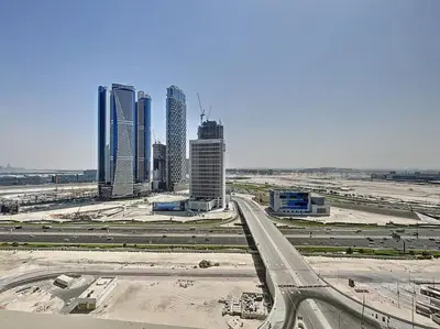 a view of a city with tall buildings and a highway at 15 Northside Tower 1 - Elegant Studio in Dubai