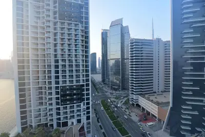 a view of a city with tall buildings at Luxury Business Bay Studio with breathtaking views. in Dubai