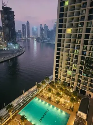 a view of a city with a river and buildings at Luxury Business Bay Studio with breathtaking views. in Dubai