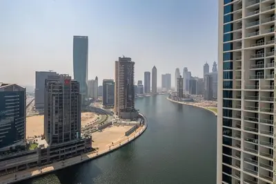a view of a river in a city with buildings at Frank Porter - Damac Prive B in Dubai