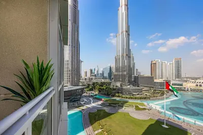 a view of the city from a balcony of a building at Durrani Homes - Lavish 3BR Besides Burj Khalifa and Fountain view in Dubai