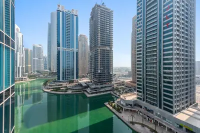 an aerial view of a city with tall buildings at StoneTree - Modern Stylish Studio in JLT in Dubai