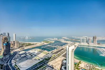 an aerial view of a city and the ocean at Exquisite 3BR at Ocean Heights Dubai Marina by Deluxe Holiday Homes in Dubai