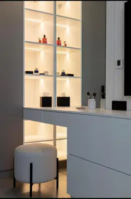 a bar with a white stool and a white chair at Mira Holiday Homes - Serviced 2 bedroom in Dubai Marina in Dubai