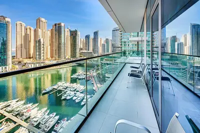 a view of a marina from the balcony of a building at Elegant 3BD family home in Marina Vida Residence in Dubai