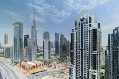 a view of a large city with tall buildings at Unique 2br with Infinity Pool view on Burj Khalifa in Dubai