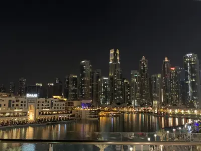 a view of a city at night with a city at 8 Boulevard Walk 'Heart of Downtown' in Dubai