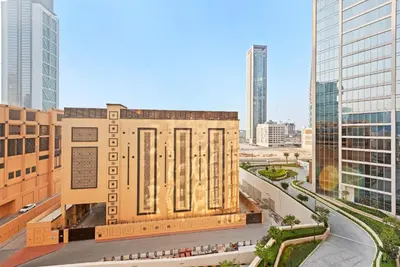 a rendering of a building in a city at Silkhaus awesome 1BDR in Opera District in Dubai