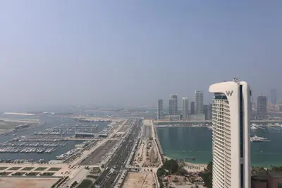 an aerial view of a city with a tall building at Deluxe - Amazing views - Elite in Dubai