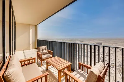a balcony with a view of the beach at Comfy family 3BD apartment in Dubai Creek Harbour in Dubai