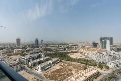 an aerial view of a city with buildings at Bloom Height - Amazing Pool - Good Wi-Fi in Dubai