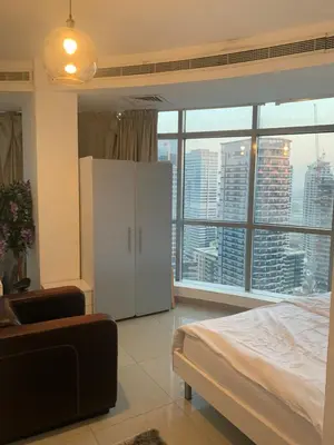 a bedroom with a bed and a large window at Coliving sharing Hostel 1 in Dubai
