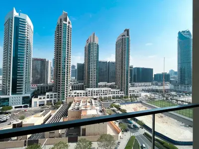 a view of a city skyline with tall buildings at Incredible stay at Burj Royale Downtown in Dubai