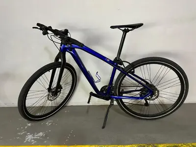 a blue bike is parked against a wall at Stylish Marina View Apartment in Dubai