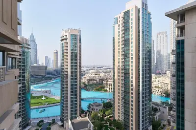 a view of a city with tall buildings at Bellavista - 1 BR - with Extra Room - Partial Fountain View in Dubai