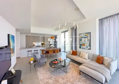 a living room with a couch and a table at Harmonious 3BR in Stella Maris, Sea View, Marina in Dubai
