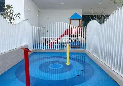 a childs play area with a pool in a room at Harmonious 3BR in Stella Maris, Sea View, Marina in Dubai