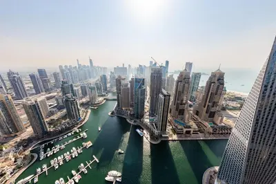 an aerial view of a city with a river and buildings at High floor Luxury 2BR - Dubai Marina Gate in Dubai