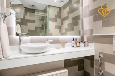 a bathroom with a sink and a mirror at Keysplease Beautiful 1 B/R Palm Jumeirah Beach Access in Dubai
