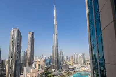 a view of a city skyline with a tall skyscraper at Frank Porter - 29 Boulevard in Dubai