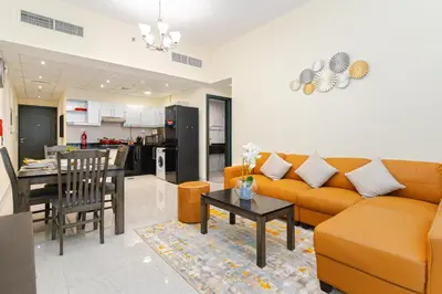 a living room with a couch and a table at Contemporary furnishing I City skyline view in Dubai
