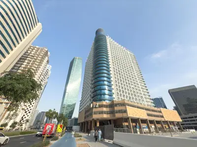 a tall building in the middle of a city at Ahlan HH - Charming Studio at AG Tower in Dubai