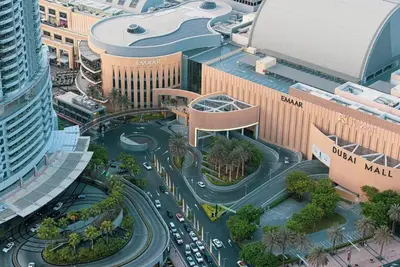 an aerial view of a city with cars on a road at cinematic&Chic Burj Khalifa &Fountain View 2BR APT in Dubai