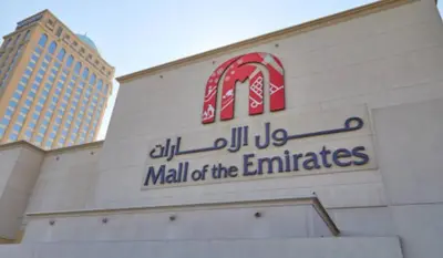 a mall of the emirates sign on a building at Partition Room 3 Mins to Mashreq Metro in Dubai