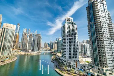 a view of a city with a river and buildings at LUX The Marina View Suite 2 in Dubai