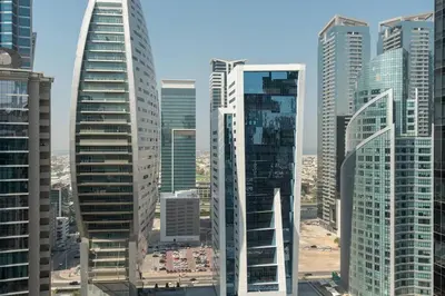a group of tall buildings in a city at 1 Bedroom in Zada Tower - Business Bay - Dubai in Dubai