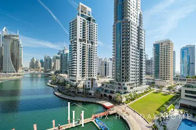 an aerial view of a city with tall buildings at LUX The Marina View Suite 1 in Dubai