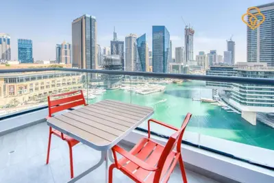 a table and chairs on a balcony with a view of a city at Keysplease Magnificent views of the Marina, Bay Central Dubai Marina in Dubai
