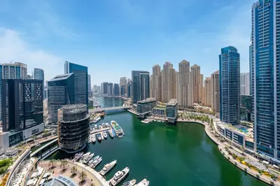 a view of a river in a city with buildings at Luxury Studio with Stunning Marina & Beach Views in Dubai