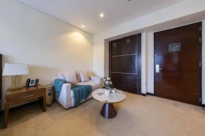 a living room with a couch and a table at Luxury Studio with Stunning Marina & Beach Views in Dubai