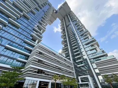 a tall building with the name marriott on it at Manzil - 2BR Apt in Al Wasl Residences with Park View, Dubai Trade Center in Dubai