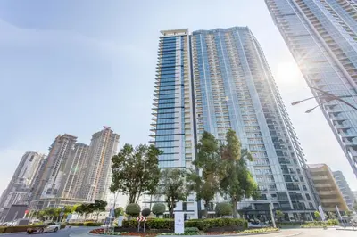 a tall building in the middle of a city at STAY BY LATINEM Luxury 2BR Holiday Home W1504 near Burj Khalifa in Dubai