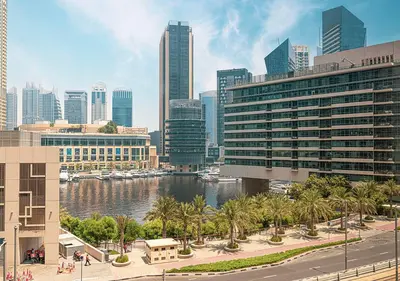 a view of a city with a river and buildings at First Class Apartments in Heart of JBR, Steps to the Beach - 121 Living in Dubai